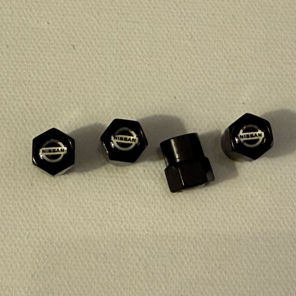 Nissan Valve Stem Caps inโBlack Set of 4 NWT